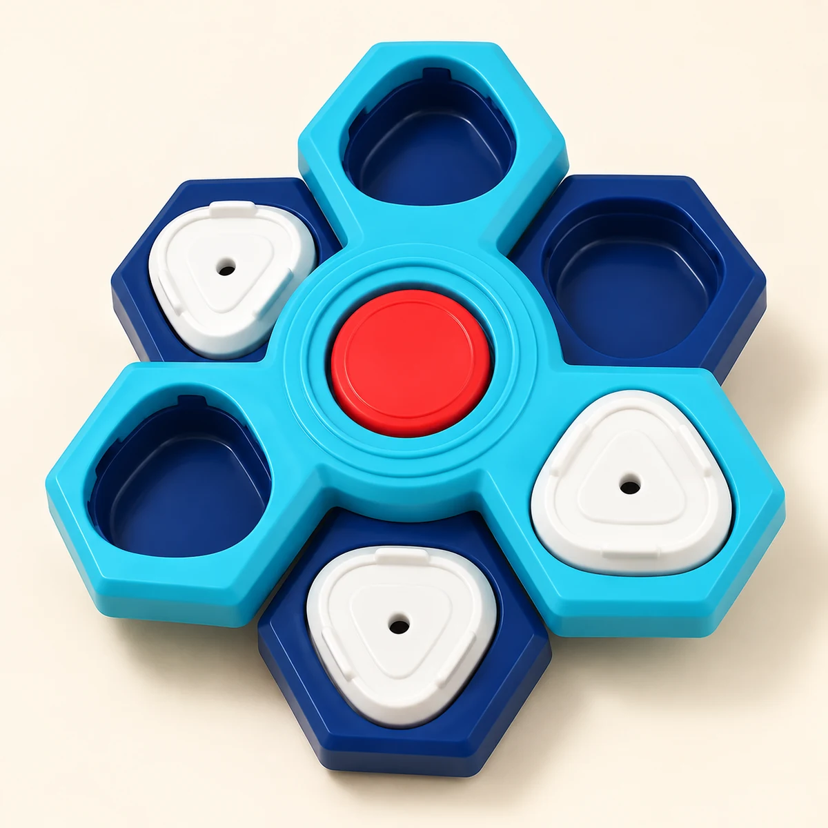 The blue Spin & Seek Treat Puzzle with six wells and three white removable lids.