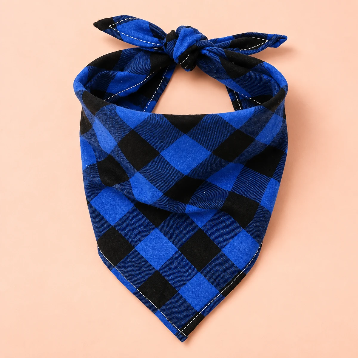 Blue-and-black checked tie-on bandana, showing its triangular front and fabric knot.